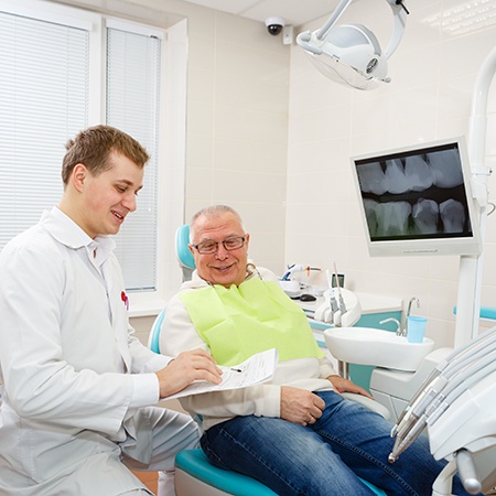 Man smiling at the dentist