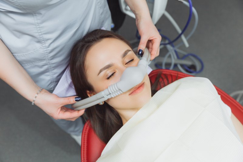 A woman experiencing what dental sedation feels like